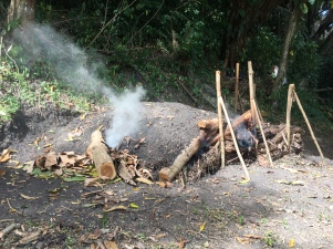 How they make their own charcoal for roasting beans at Crayfish Chocolate.